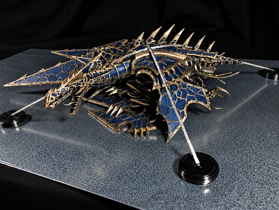 Large flying vehicle miniature anchored to a magnetic steel plate