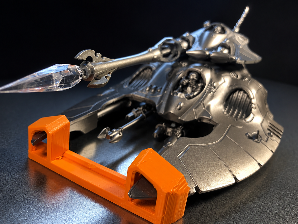 Eldar grav-tank miniature mounted in an orange Magnetic Anchor