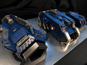 3D printed Magnetic Anchors holding vehicle miniatures on a steel plate