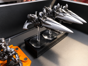 Flight stand tray with jetbike miniatures and weapon storage in a transport case