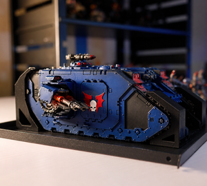 Land Raider pattern tank miniature in a Magnetic Anchor transport holder
