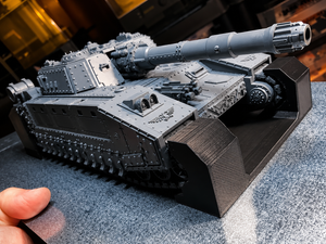Unpainted super-heavy tank miniature secured by Magnetic Anchors for transport