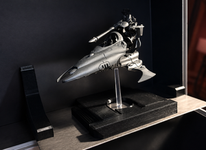 Flying miniature on a clear flight stand held by a magnetic base