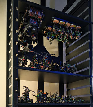 Ork miniature army stored on a magnetic display shelf using Magnetrays trays