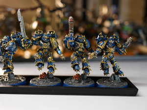 Five painted miniatures on 32 mm bases locked into a magnetic infantry tray
