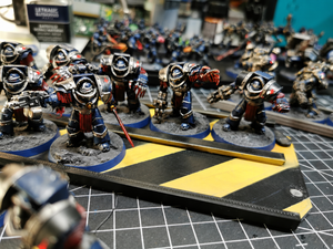 Terminator miniatures on a magnetic infantry tray with hazard stripe design