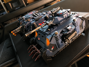 Battle tank miniatures secured with Magnetic Anchors inside a carry case