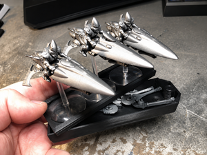 Weapon options box stacked under a flight stand tray of jetbike miniatures